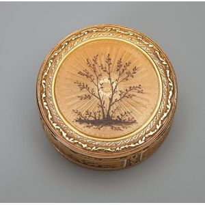 An enamelled two colour gold bonbonniere, maker's mark of Les…