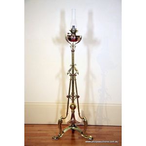 A striking Art Nouveau brass and copper standard lamp, circa…