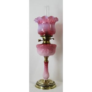 A late 19th century Victorian ruby overlay glass oil lamp with…