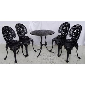 Five piece cast aluminium outdoor setting comprising of four…