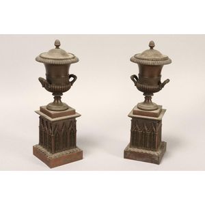 Pair of 19th century bronze candlestick urns, in patinated…