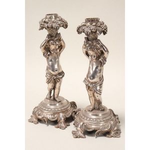 Lovely pair of French silvered bronze candlesticks each…