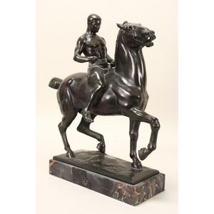 Good 20th century bronze figure group, c.1920, depicting a man…