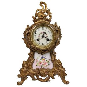 Antique gilded mantle clock - price guide and values