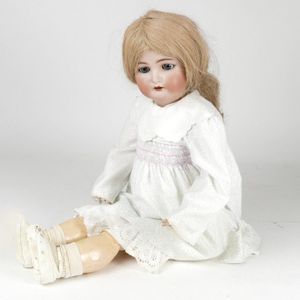 An antique Simon & Halbig 'Dolly Face' doll, glass eyes, open…