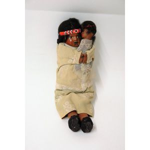 A vintage composite and cloth bodied Maori mother and child…