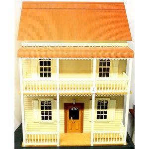 A impressive three story dolls house with four rooms and Attic,…