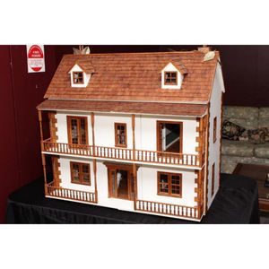 Delightful three level dolls house, opening to reveal three…