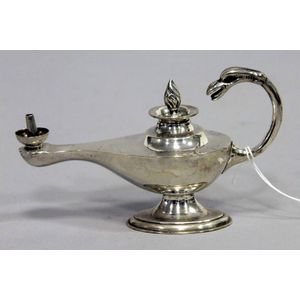 A sterling silver Aladdin's oil lamp on oval form base with…