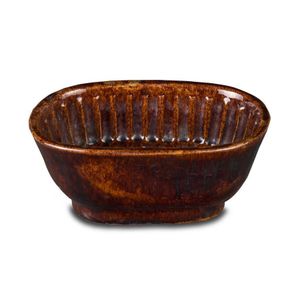A treacle glaze wheat sheaf decorated pottery jelly mould,…