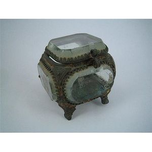 A gilt metal and glass trinket box