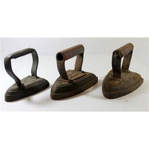 A collection of three various flat irons 12 cm high, 15 cm long,…