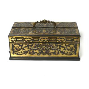 A 19th century French Boulle desk set, in the form of a small…