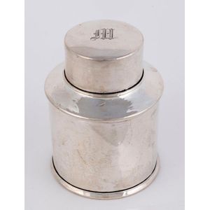 An English sterling silver cylindrical tea caddy by Williams of…