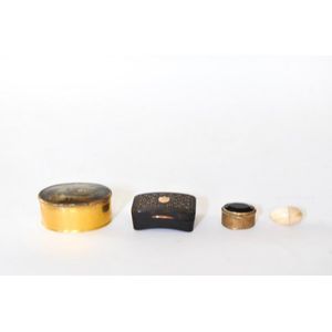 A collection of small boxes including an ivory acorn, a…