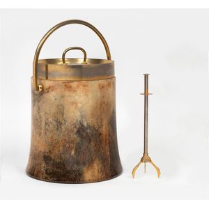 An unusual brass mounted donkey skin and resin ice bucket by…