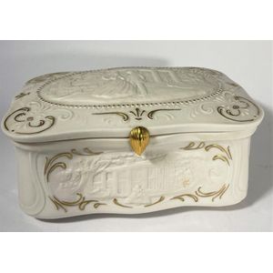 A Franklin Mint porcelain jewellery box commemorating the 50th…