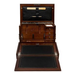A late Victorian walnut gentleman's desk compendium, the hinged…