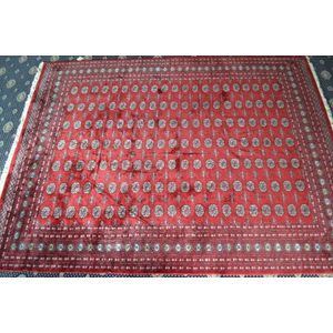 A Bokhara fine wool floor carpet. Full room size 300 x 450 cm