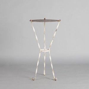 A vintage French outdoor table, a twisted metal three legged…