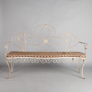 A wonderful French iron garden bench seat., Decoratively made…