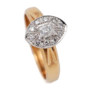 A vintage 18ct gold diamond ring, white mount centring a square…