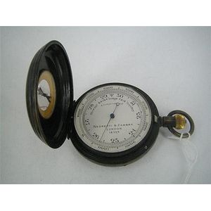 A Negretti & Zambra pocket barometer/compass in nickel…