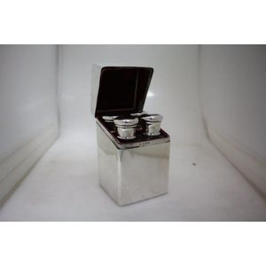 A sterling silver cased four bottle travelling perfume set, 11&hellip;