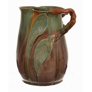 Remued (incised Ware C.1933-56). Gumnut branch handled jug…