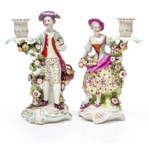 A PAIR OF CHELSEA FIGURES OF SIGHT AND SMELL