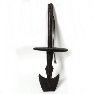 A Melanesian food hook, with unusual rodent proofing disc…