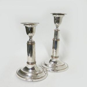 A pair of Old Sheffield Plate telescopic candlesticks, vase…