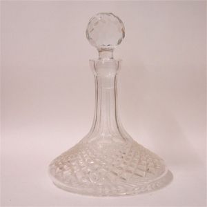 A Waterford Crystal ship's decanter, hobnail cut spreading…