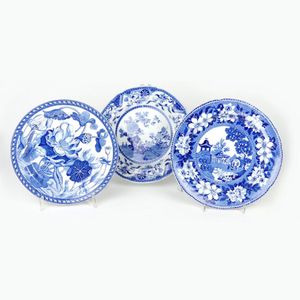 Three early 19th century plates, all decorated in blue and…