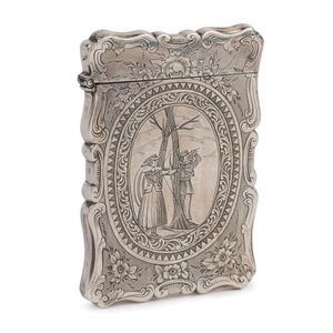 An antique sterling silver calling card case with floral…