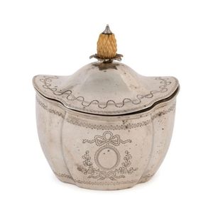 An unusual sterling silver tea caddy with engraved decoration…