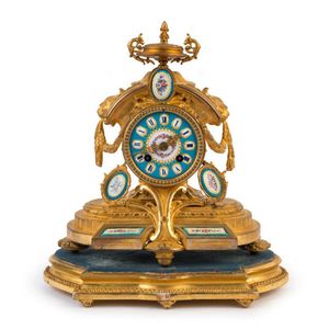 Antique gilt metal / ormolu mantle clock - price guide and values