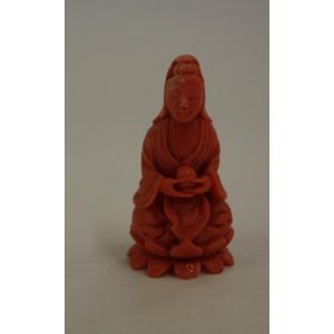Oriental carved coral figure of a god, 3.5 cm high approx