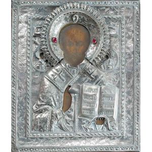 A Russian Icon of Christ Pantocrator with embossed silver oklad,…