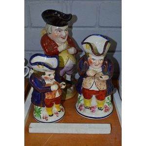 Three antique jugs of 'Taking Snuff' in various sizes, approx…