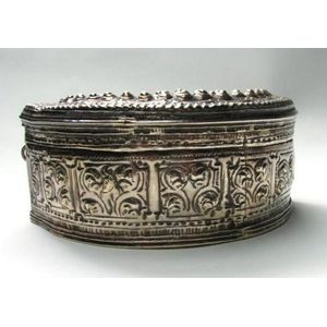 A Burmese silver half circle hinged betel box, 19th century,…