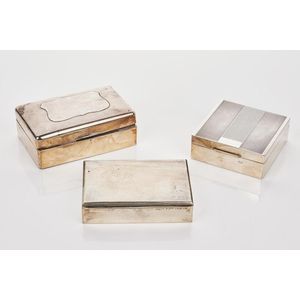 Three silver cigarette boxes comprising one English box, and…