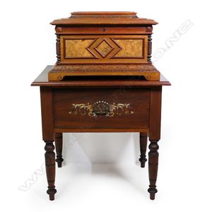 A 19th century walnut cased Polyphon, the tabletop player with…