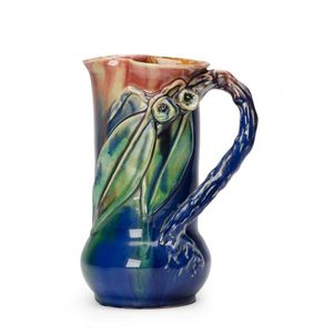 Remued: Pottery jug with branch handle, gumnuts & leaves glazed…