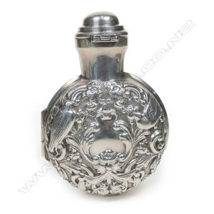 A Late Victorian fancy silver covered smelling salts bottle,&hellip;
