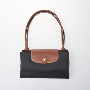 Vintage Longchamp handbags and purses - price guide and values