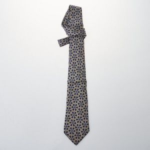 A Hermes Silk Horseshoe Tie. Featuring a dark blue background&hellip;