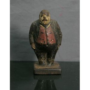 Cast iron figure of George Reid. Worn original paint. Small…