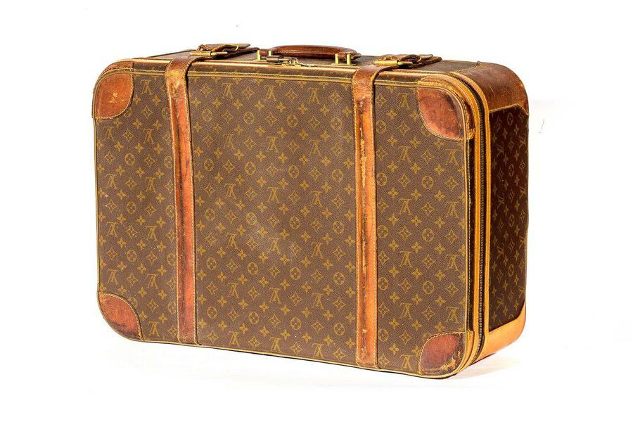 A Louis Vuitton leather bound suitcase, French, 20th century,… - Luggage & Travelling ...