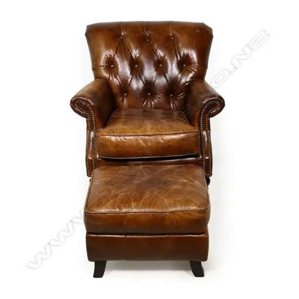 A gentleman's leather chair, deep caramel tone, roll arm,… - Zunknown ...